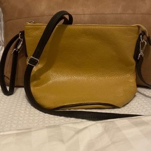 Italian pebbled leather crossbody by Valentina is very good condition.